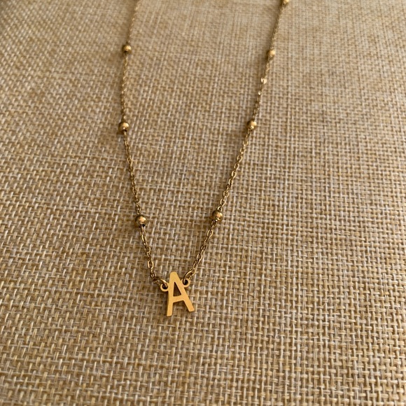 Gold tone letter A pendant, 16” sits right at collar bone. - Picture 3 of 4